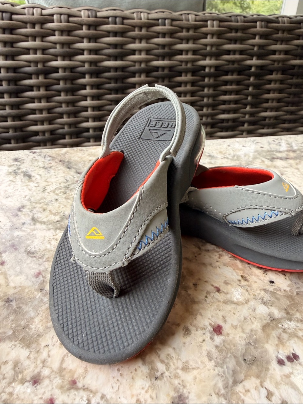 Reef Kids Grey and Orange Flip Flops with Yellow Logo